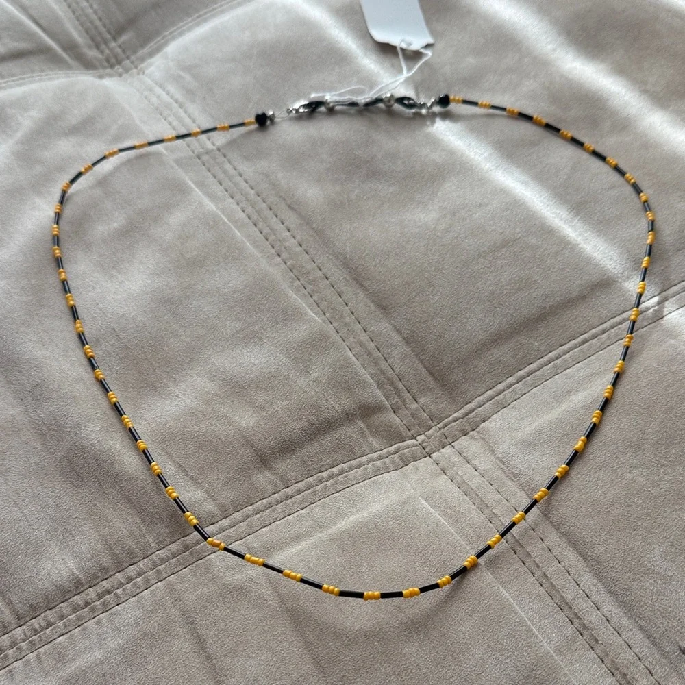 Elegant Black and Gold Sunglasses Beaded Holder